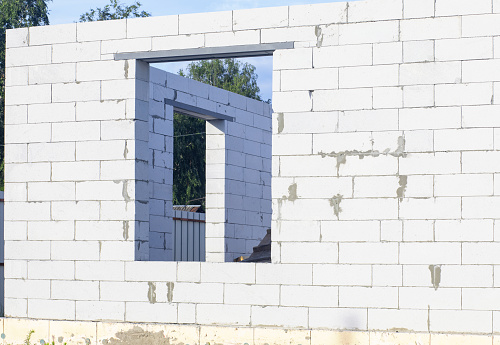 Window opening of gas-block masonry at the construction of a house.