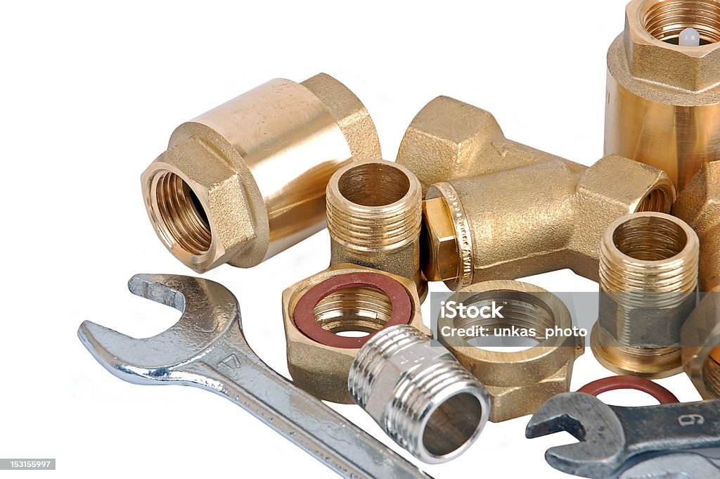 Water pipe valve and wrench Water pipe and wrench, isolated on white background Brass Stock Photo