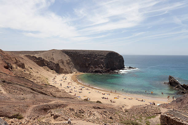 istock tourists sunbathing and relaxing 153156842
