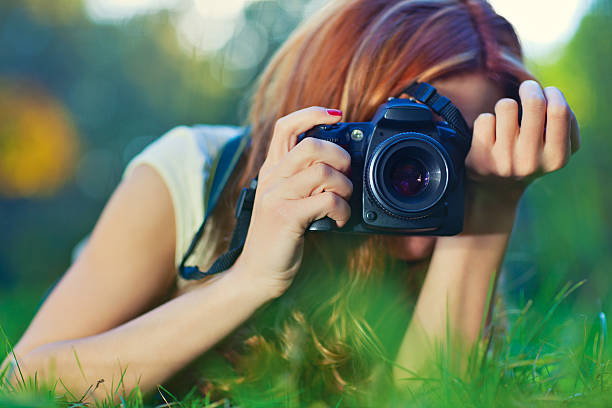 istock Young woman photographer 153159125