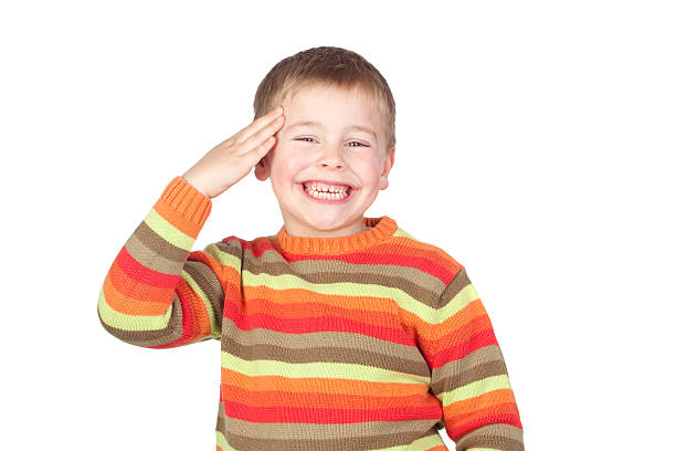istock Adorable child doing a military salute 153159397