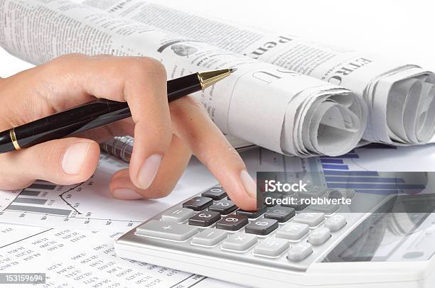 Womans Hands Using Calculator And A Pen Stock Photo - Download Image Now - Adult, Analyzing, Business