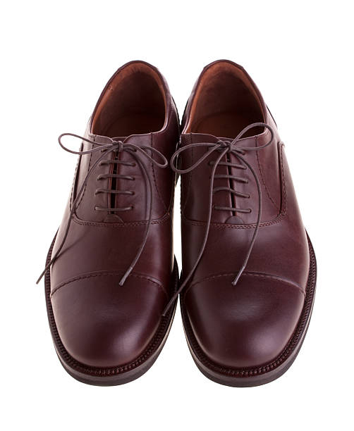 istock Men's brown shoes isolated on white 153160133