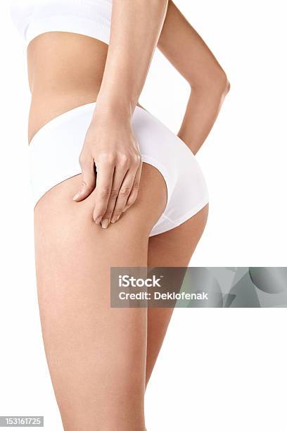 Cellulite Free Womans Backside In Front Of White Background Stock Photo - Download Image Now