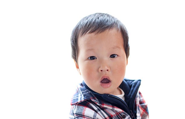 istock asian baby boy looking with suprise expression 153162249