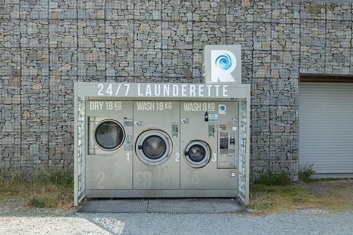 Revolution 24 outdoor self-service laundry facilities placed outside