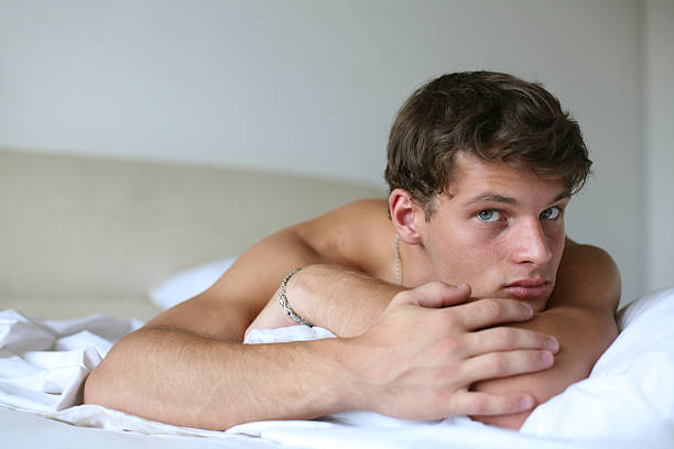 istock Young Sexy Man on a Bed 153162448