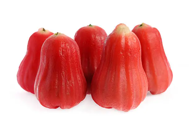 Five water apples isolated on white background.