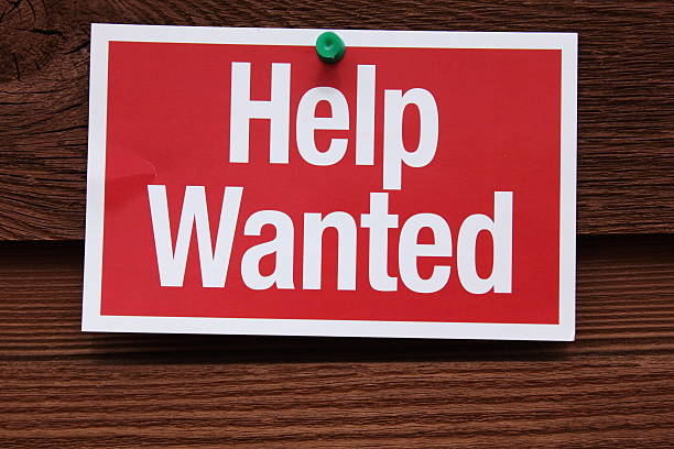 istock Help Wanted Sign on wooden background 153166229