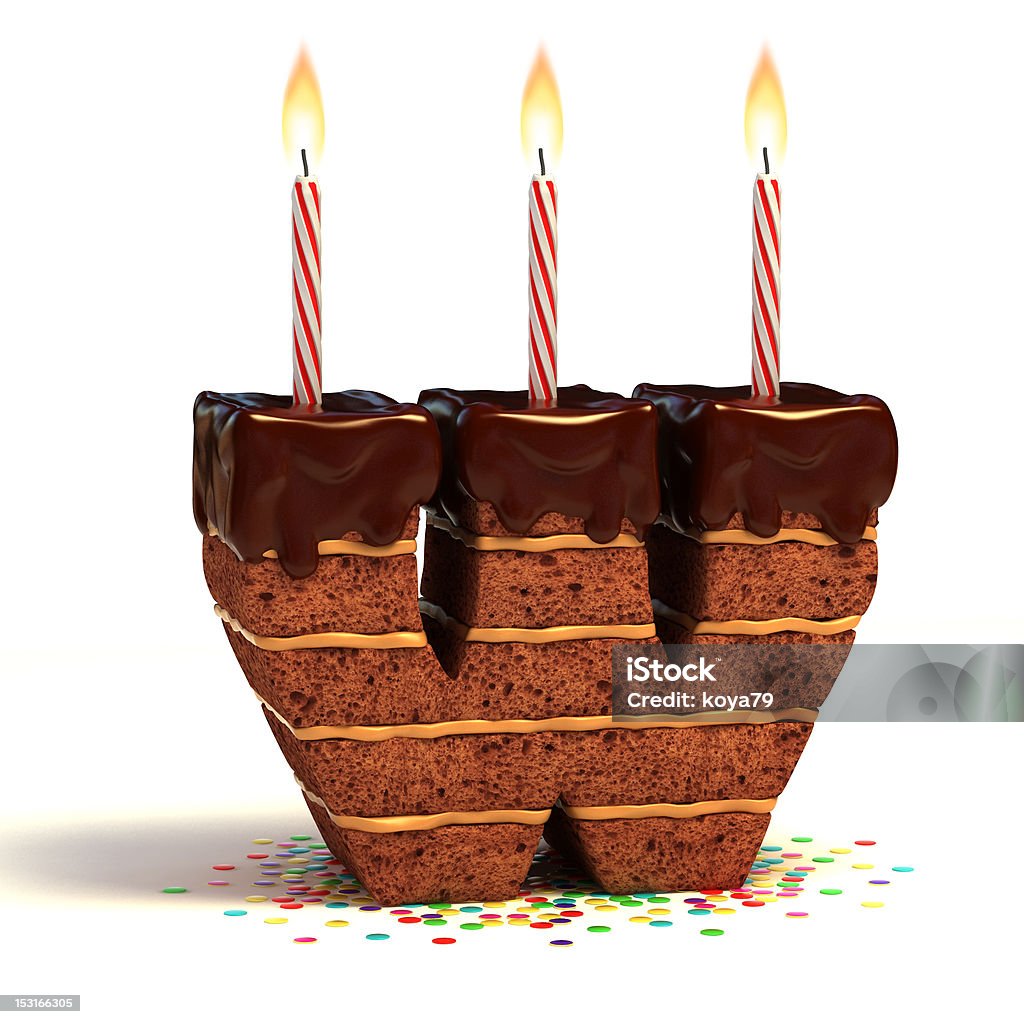 letter W shaped chocolate cake letter W shaped chocolate birthday cake with lit candle surrounded by confetti Alphabet Stock Photo