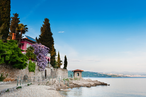 Stock photo of Adriatic sea scenic view. Opatija town, popular tourist destination of Croatian coast.