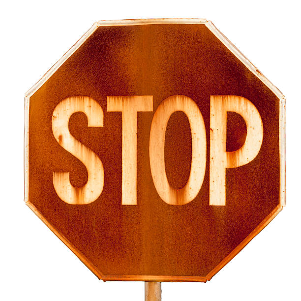 istock old rusty road sign stop isolated on white background 153167497