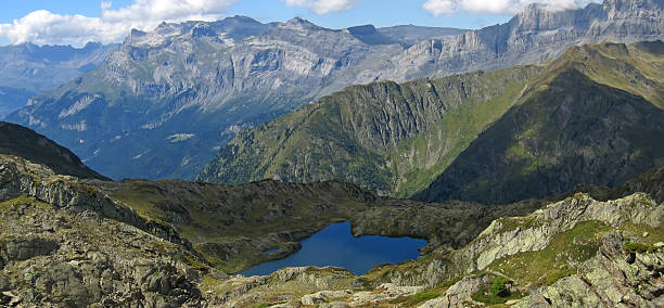 Small lake and the mountains stock photo