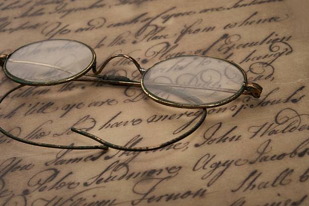 istock Old glasses on the vintage document 153168345