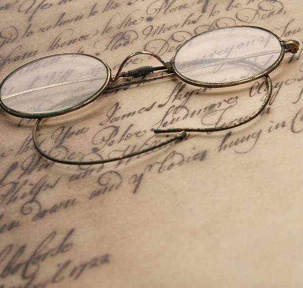 istock Old glasses on the vintage document 153168348