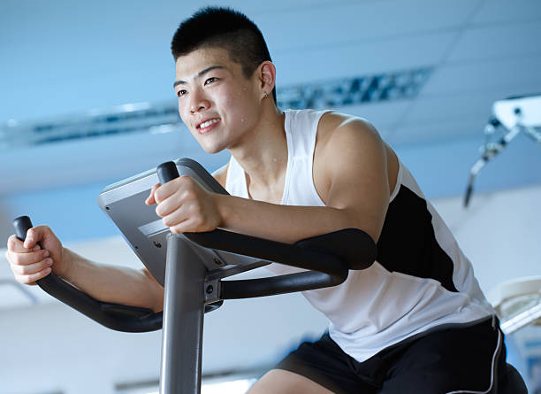 istock Asian man working out at the gym 153169002
