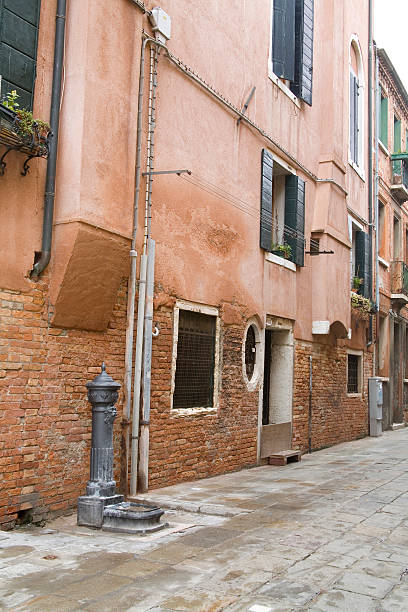 istock Old Rainy Venice Street 153169048