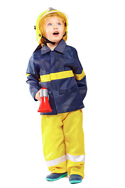 istock Cute boy in fireman costume 153169281