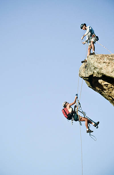 istock Team of rock climbers. 153171874