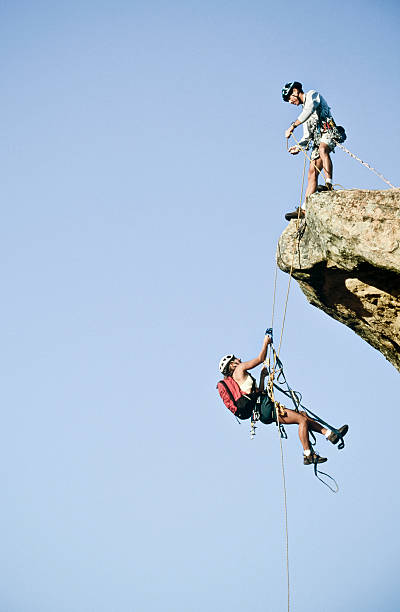 Team of rock climbers. stock photo