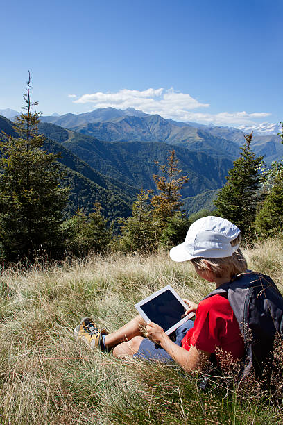 Boy using a tablet computer stock photo