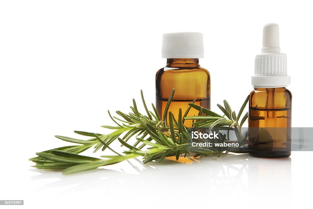 Rosemary essential oil Aromatherapy with essential oil of rosemary Aromatherapy Oil Stock Photo