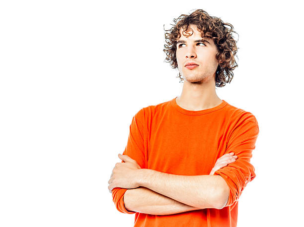 istock young man suspicious looking up portrait 153173719