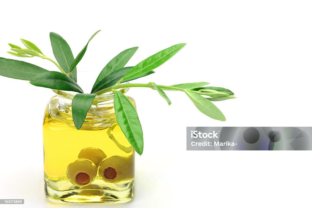 olive oil I attach an olive branch to olive oil and Branch - Plant Part Stock Photo