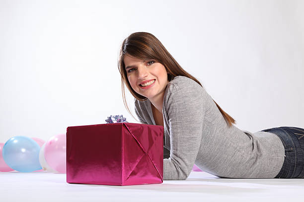 istock Big smile from happy woman with birthday present 153175281