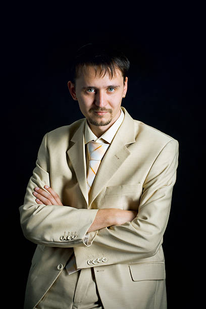 istock Businessman standing up a pensive pose 153175429