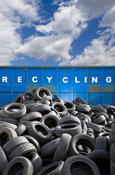Recycling business container and tires stock photo