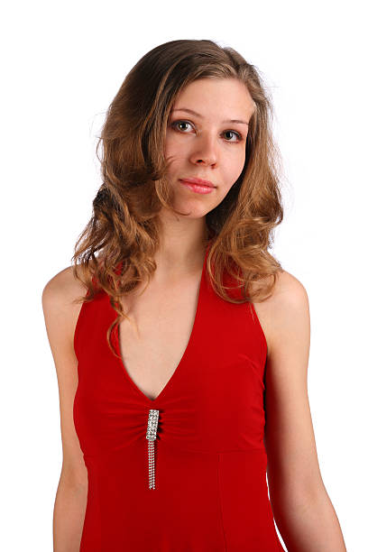 Girl in red dress posing stock photo