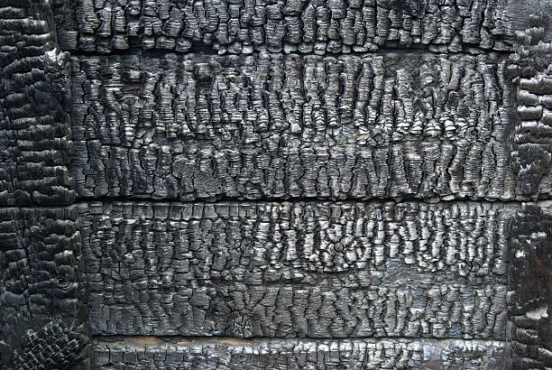 Charred wall  wooden planks, boards. Full frame, background