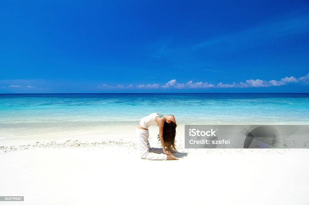 Yoga am Strand - Lizenzfrei Achtsamkeit - Persönlichkeitseigenschaft Stock-Foto