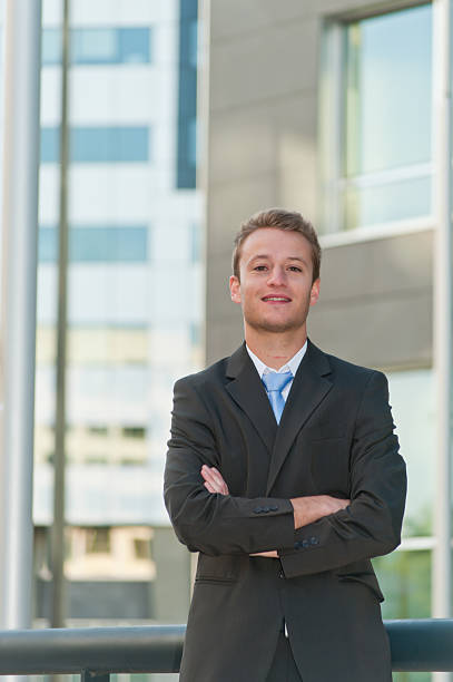 istock Young buisness man with crossed arms 153179482