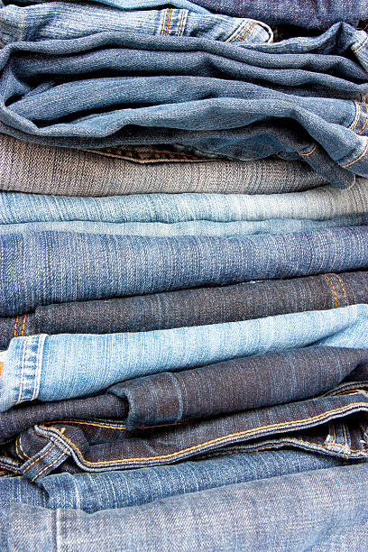 istock pile of jeans 153179778