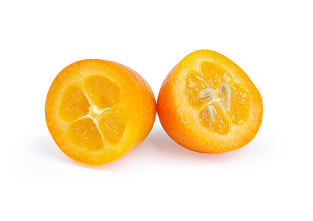 istock Sliced kumquat isolated on the white background 153179794