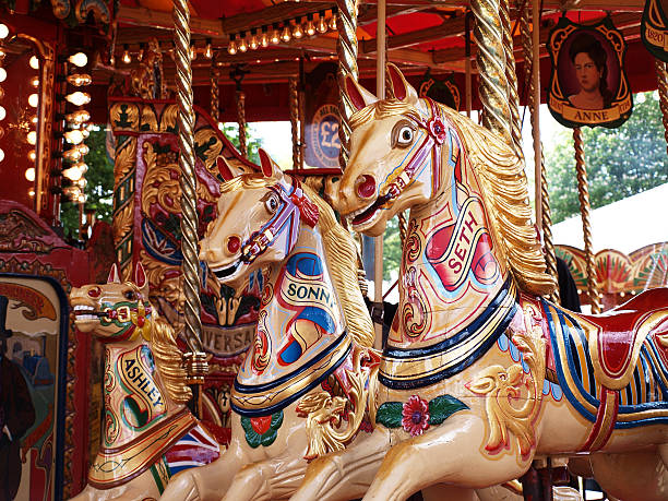 istock Painted Ponies on traditional carousel ride 153180043