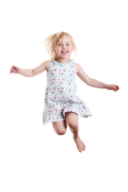 istock little girl jumping 153180468