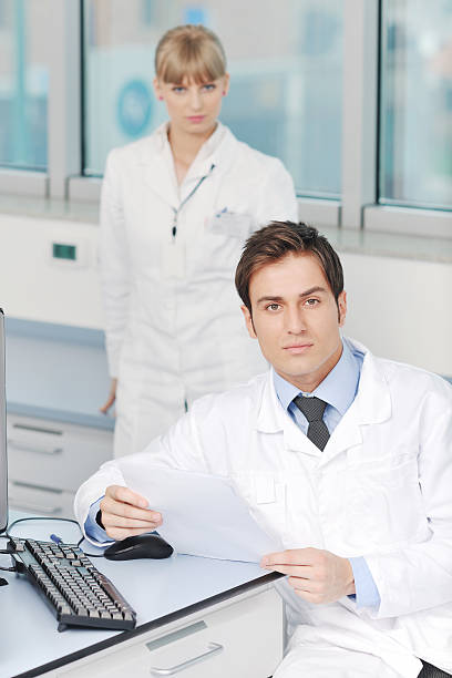 istock Scientists couple  together in a laboratory 153180620