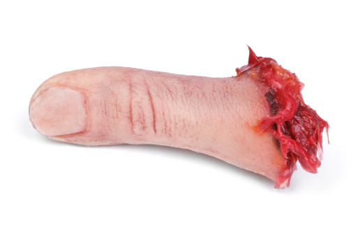 artificial human finger cut out from hand, minimal natural shadow in front, see also: