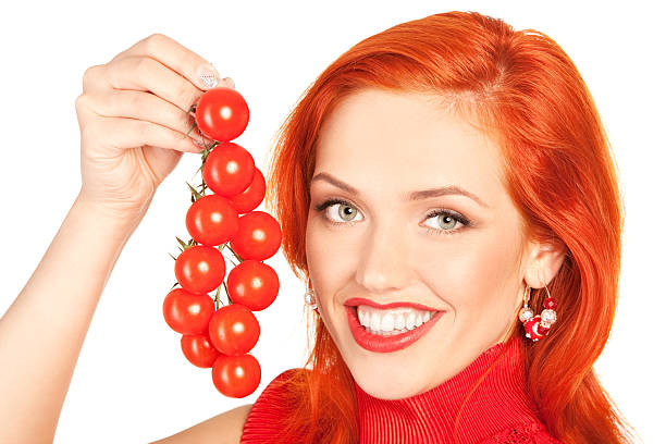 woman with cherry tomatoes