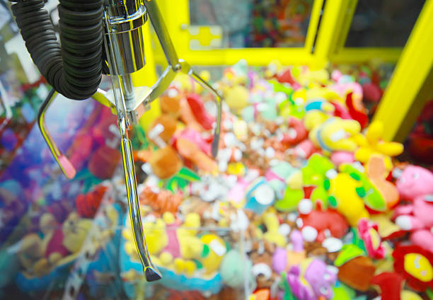 istock Capture device on background of toys in arcade machine 153181283