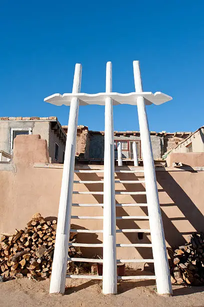Traditional white ladders in Acoma Pueblo, NM
