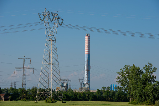 Chimney of a thermoelectric plant in the middle of the countryside