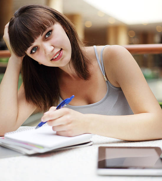 istock Beauty girl with tablet PC indoors 153185912