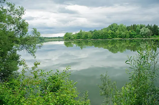 green river lech with beautiful reflection scene in germany,europe.