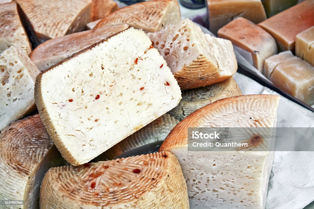 Caciotta cheese Caciotta cheese with chilli pepper on market stall, Palermo, italy Cheese Stock Photo