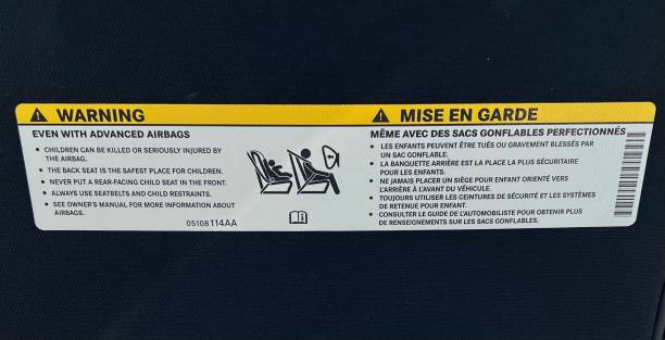 istock Airbag warning sign on a sun visor. 1531940143