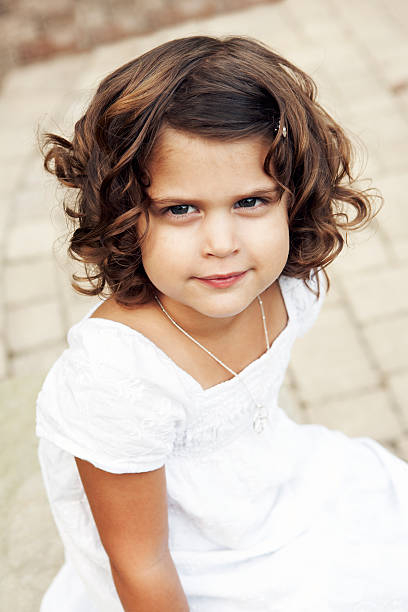 Little girl with a cute smile stock photo